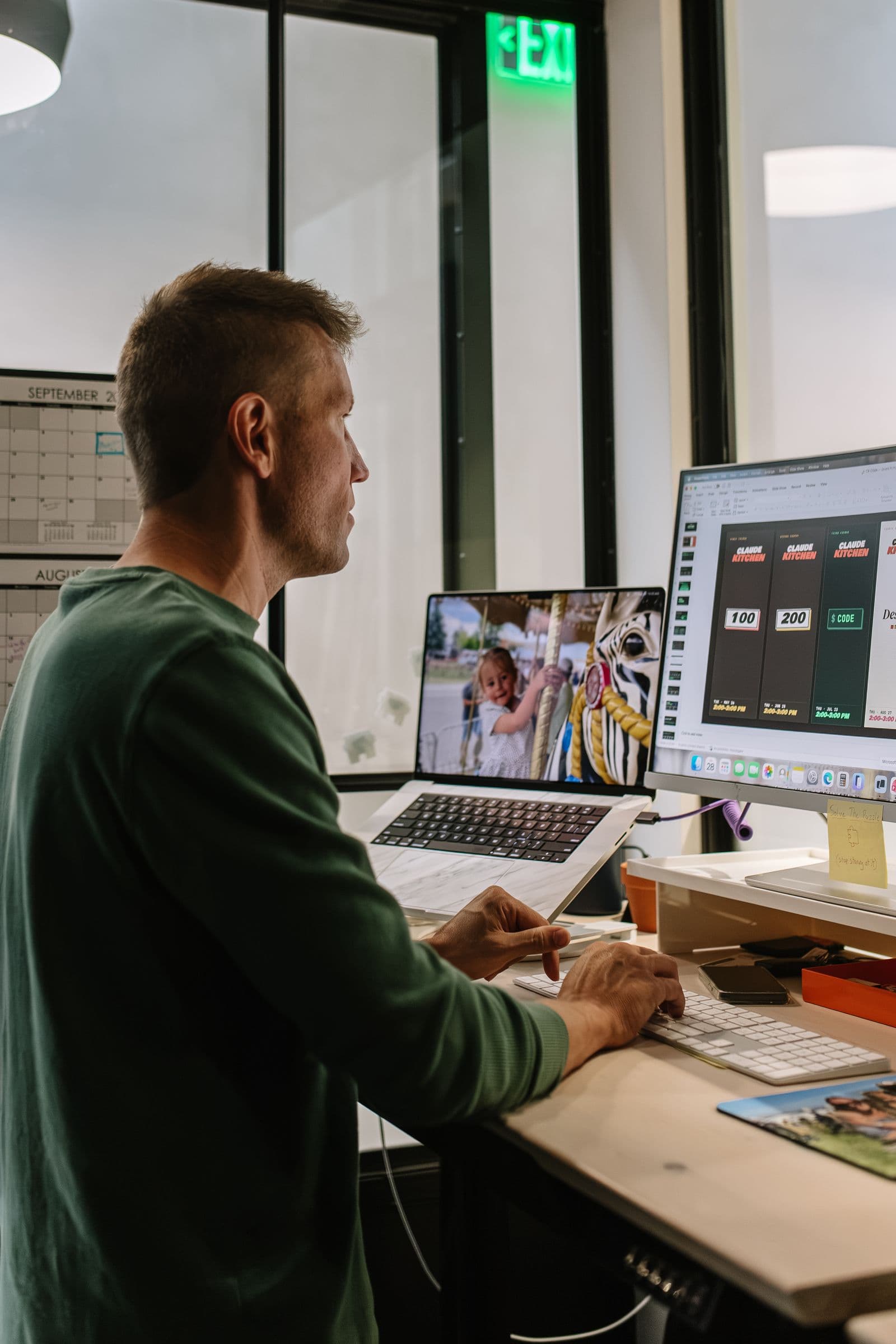 Christian building at his desk