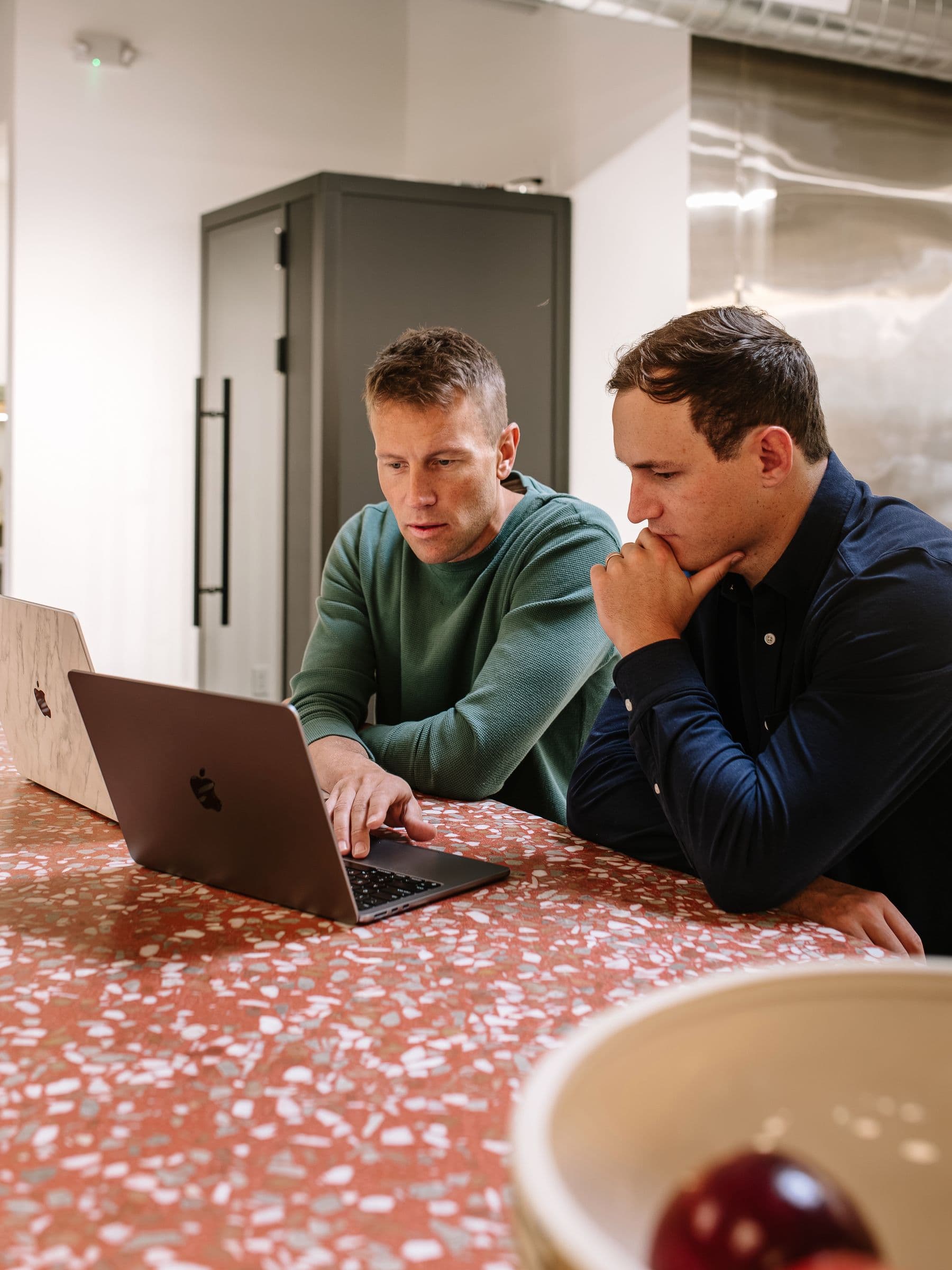 Christian working through a build with a client